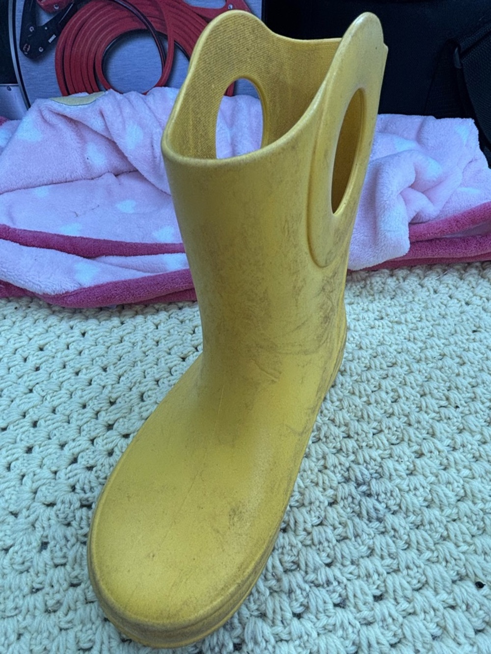 Okabashi mismatched size yellow rubber boots (right is child 12/left is 11)
